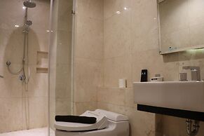 Spacious Studio Room at Capitol Suites Apartment