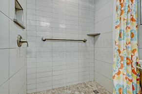 High End Coastal Feel Condo with Access to Beachside Pool by RedAwning