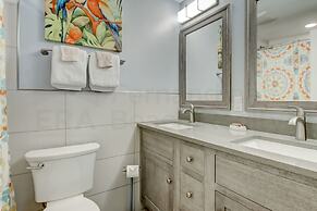 High End Coastal Feel Condo with Access to Beachside Pool by RedAwning