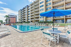 High End Coastal Feel Condo with Access to Beachside Pool by RedAwning