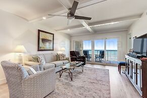 High End Coastal Feel Condo with Access to Beachside Pool by RedAwning