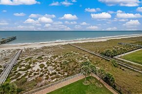 High End Coastal Feel Condo with Access to Beachside Pool by RedAwning