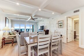 High End Coastal Feel Condo with Access to Beachside Pool by RedAwning