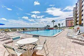 High End Coastal Feel Condo with Access to Beachside Pool by RedAwning