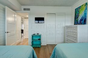 High End Coastal Feel Condo with Access to Beachside Pool by RedAwning