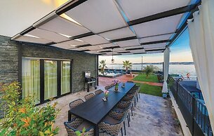 Beachfront Villa Baronessa with Pool