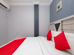 OYO 89587 IM Hotel