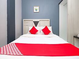 OYO 89587 IM Hotel