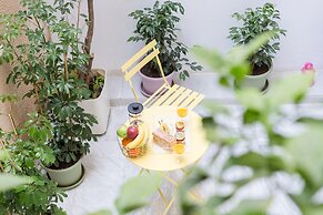 Grandma's Chic & Bright Athenian Home with a Patio