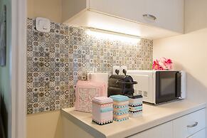 Grandma's Chic & Bright Athenian Home with a Patio