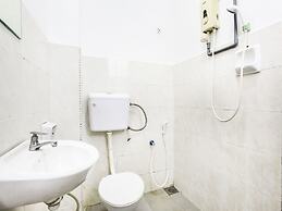 OYO 89615 T Family Hotel