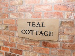 Teal Cottage