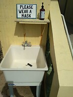 Pal's on the Beach - A Gold Standard Hotel