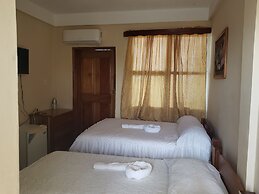 Pal's on the Beach - A Gold Standard Hotel