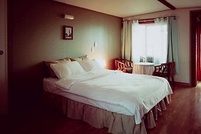 Windmill and Sea Pension