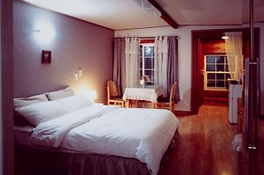 Windmill and Sea Pension