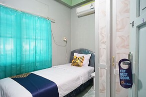 SPOT ON 1854 Sepinggan Asri Syariah Guesthouse