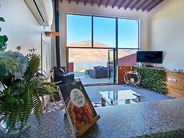 Mountain, lake, sun and this beautiful home