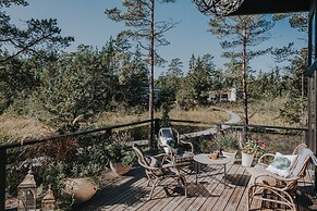 Mavens Kustnära Stugor
