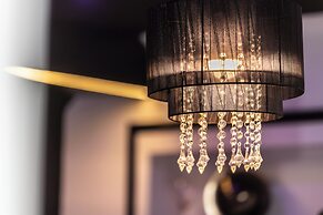 Appart Hotel GLAM88 Suites SPA et SAUNA