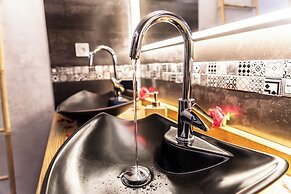 Appart Hotel GLAM88 Suites SPA et SAUNA