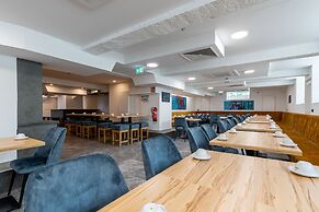 Trip Inn Living & Suites