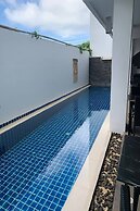 One World One Home Naiharn Hotel