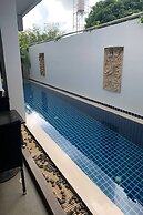 One World One Home Naiharn Hotel