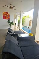 One World One Home Naiharn Hotel