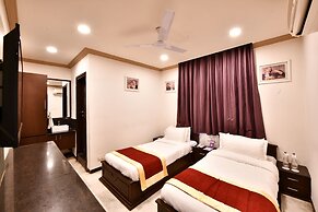 Click White House Residency Vadodara