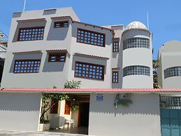 Hostal Macaw