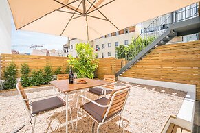 Wood Wall & Garden Apartment