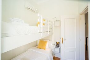 Panoramic Tagus River Terrace Apartment in Alfama