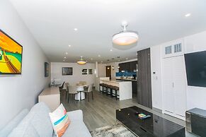 Spacious Condos with Private Balcony at Discovery Bay - Free Wifi, Nea