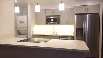 Spacious Condos with Private Balcony at Discovery Bay - Free Wifi, Nea