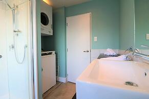 Spacious Central City Apartment with Parking