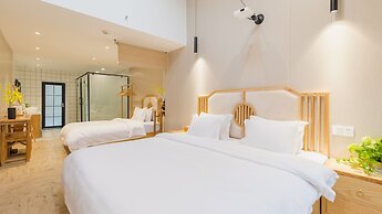 Floral Hotel Yi Shu Yu She Zhouzhuang