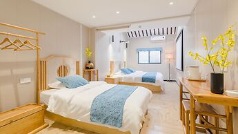 Floral Hotel Yi Shu Yu She Zhouzhuang