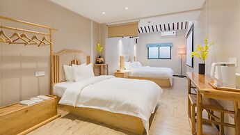 Floral Hotel Yi Shu Yu She Zhouzhuang