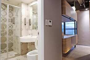 Kiwi Share Hotel - Zhongli Station Branch - Hostel