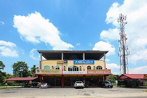 SPOT ON 89857 Azra Inn Rumah Tumpangan