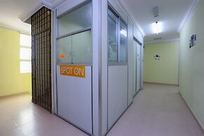 SPOT ON 89857 Azra Inn Rumah Tumpangan