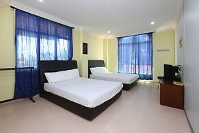 SPOT ON 89857 Azra Inn Rumah Tumpangan