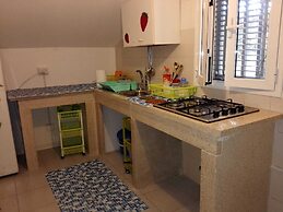 Baia del Conte Apartments