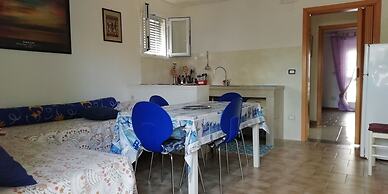 Baia del Conte Apartments