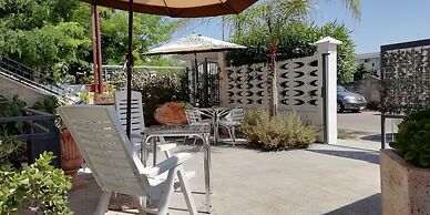 Baia del Conte Apartments