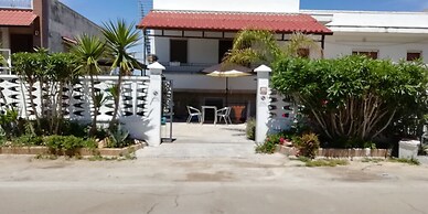 Baia del Conte Apartments