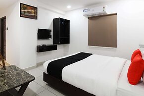 Capital O 63727 Mythri Hotel