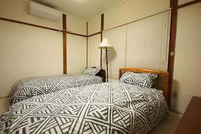 Sapporo Dome Front House