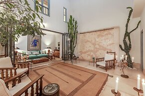 Riad Le J
